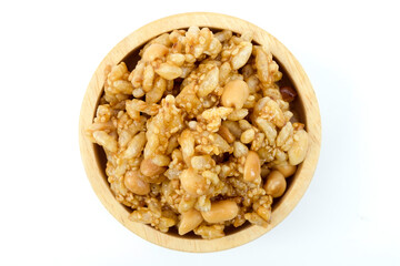 A wooden cup of Kra-ya-sat, Thai dessert, prepared for Buddhist religious events, isolated on white background top view flat lay clipping path, stack.