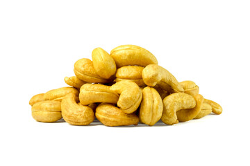 Heap of roasted cashew nuts isolated on white background with clipping path closed up