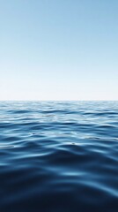 Fototapeta premium Calm Sea Water with Soft Wavelets Reflecting a Clear Sky
