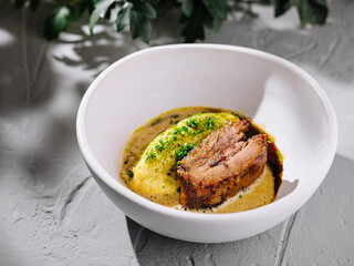 Braised beef short rib with parsnip puree and rich brown sauce