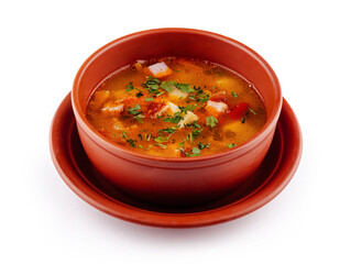 Fresh hot soup with meat and vegetables served in brown bowl