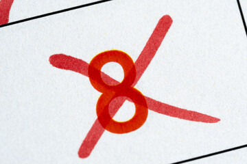 Eighth number is crossed out with red marker on calendar.