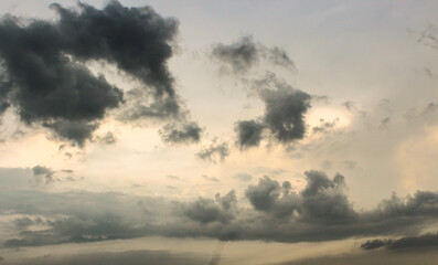 Dark clouds in the sky. A background image of dark clouds in the sky.