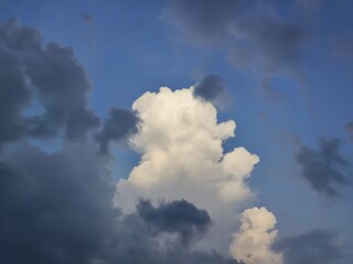 Clouds in the blue sky before a thunder-storm, India.