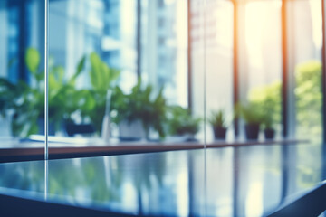 blurred background of a light modern office interior. Abstract light bokeh at office interior background for design.