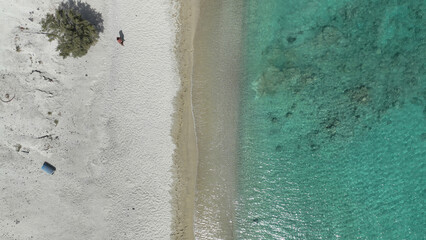 Aerial drone photo of white sandy paradise beach of Prassa with turquoise crystal clear sea voted one of the best in Greece, Kimolos island, Cyclades