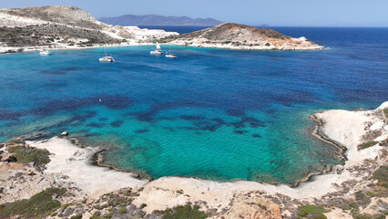 Obraz premium Aerial drone photo of white sandy paradise beach of Prassa with turquoise crystal clear sea voted one of the best in Greece, Kimolos island, Cyclades