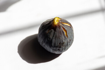 High-angle view of a fig on a table.