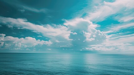 Cloudy sky over a blue ocean