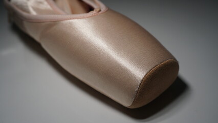 Brand new satin ballet pointe shoe with a suede tip