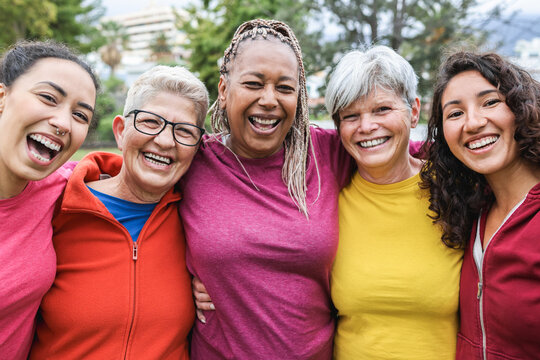 Happy multi generational women having fun together - Multiracial friends laughing on camera after sport workout outdoor - Main focus on african female face