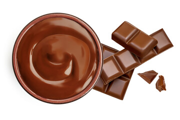 Chocolate cream in bowl isolated on white background. Melted chocolate and chocolate bar pieces top view.  Chocolate spread Flat lay.