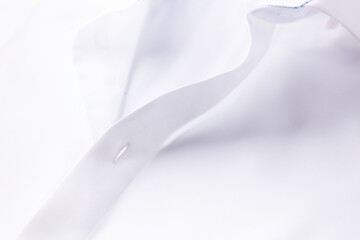 Close up of white Men's shirt.