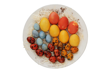 Easter eggs in rustic plate. Isolate on a white background. Easter traditions. Variety of painted eggs. Home decor. Country style. Top view.