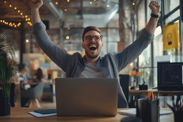 Fototapeta premium a young businessman celebrating success in the office with a laptop, happy male feeling overjoyed and excited about his successful business venture,generative ai