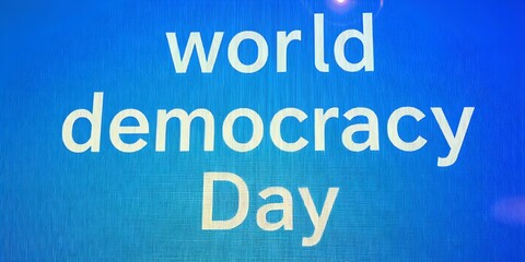Obraz premium World Democracy Day Banner with Blue Background