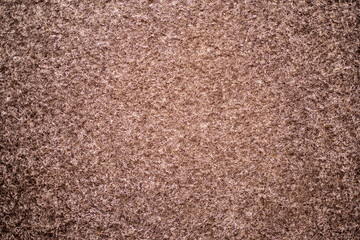 Close-up of carpet texture, highlighting the weave pattern, fibers, and color variations, ideal for interior design, home decor, or flooring backgrounds.