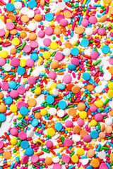 Candy bits in a pile, vibrant colors and glossy finish.