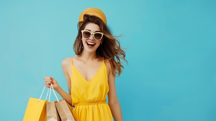 Portrait of an Excited Beautiful Girl in Dress and Sunglasses Holding Shopping Bags, Isolated on Blue Background