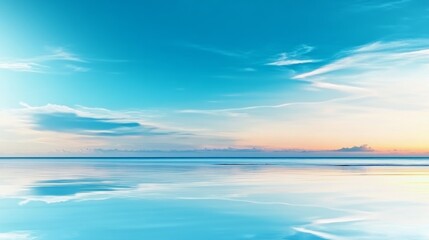 Obraz premium Calm Ocean Sunset with Clouds Reflection