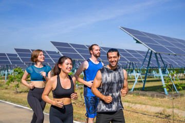 People are exercising near solar powerplant.