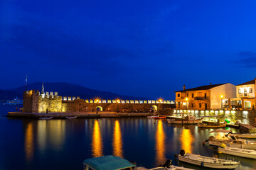 Nafpaktos city lights in blue hour. Famous touristic destination.
