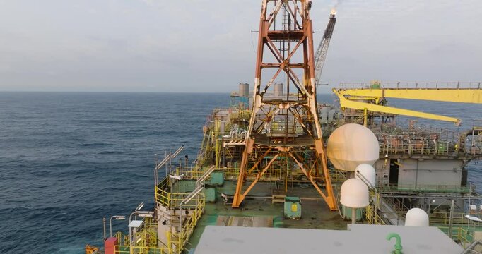 Macao, Brazil - 01 August 2024: Aerial view of the industrial offshore support vessel FPSO FORTE surrounded by ocean waves, Macae, Brazil.