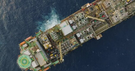 Macao, Brazil - 01 August 2024: Aerial view of the industrial offshore support vessel FPSO FORTE surrounded by ocean waves, Macae, Brazil.