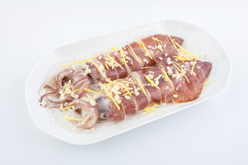 Fresh squid on plate