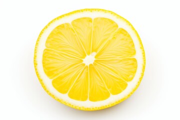 Freshly cut lemon slice on a plain white background highlighting its vibrant yellow color