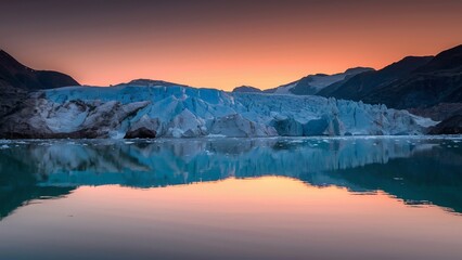 Fototapeta premium Glacier Reflecting Sunset Glow in a Tranquil Setting