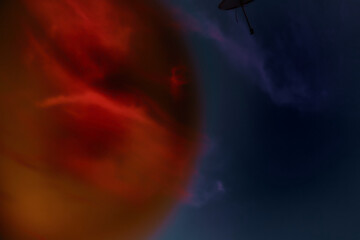 Red silhouette of a planet against the background of a satellite antenna and bottomless dark space, illustration of distant space, communication, connection, ether