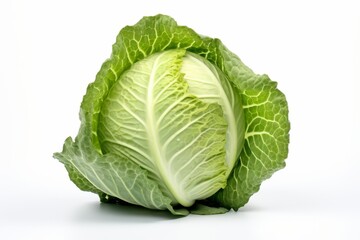 Obraz premium Fresh green cabbage on a plain background ready for cooking and healthy meal preparation