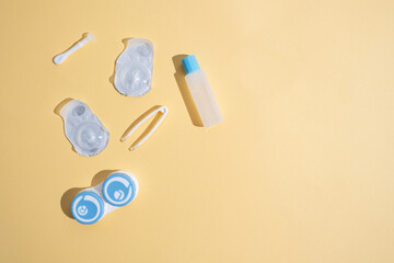 Container for lenses and accessories on a light background. Health and medicine concept