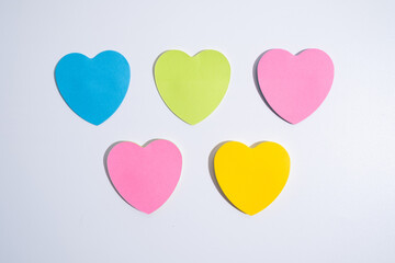 Colored hearts on a colored background. Holiday concept, Valentine's Day, gift to your loved one. Banner. Flat lay, top view