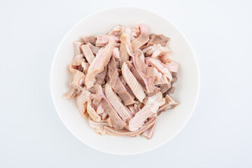 A dish of blanched pork belly slices