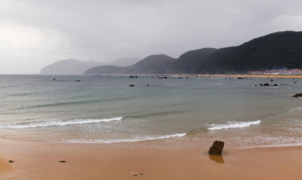 Cantabria, Spain, beach Trengandin in Town of Noja, with karst formations revealed by a low tide 
