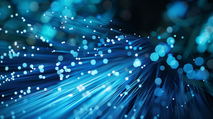 Vibrant blue abstract background featuring flowing light trails and glowing particles creating a dynamic and energetic visual effect, suitable for digital art and technology themes