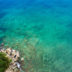Turquoise water and rocks along the coastline