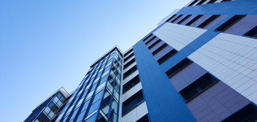 A residential apartment building from top to bottom. Commercial real estate, building. Buying,...