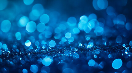 Glistening blue droplets create a tranquil atmosphere in an abstract illustration of shimmering light and color