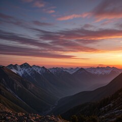 Fototapeta premium Breathtaking Sunset Over Snow-Capped Mountain Peaks and Forests..