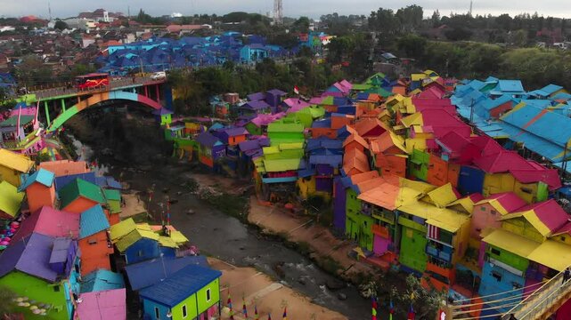 Aerial view of colourful painted houses in the rainbow village of Jodipan, Malang City, Indonesia.