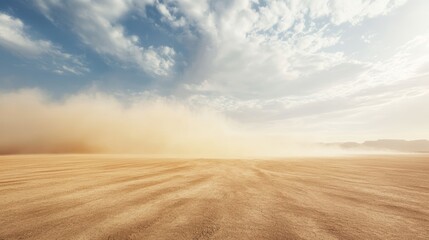 Wide angle view of a dusty sandstorm sweeping across a vast arid desert landscape