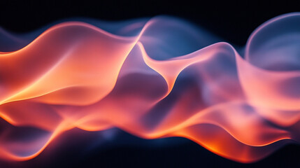 Flowing waves of vibrant orange and blue flames dance gracefully on a dark background