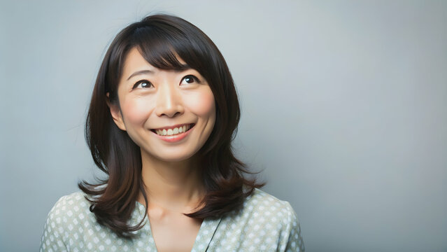 Japanese woman with a cute and puzzled expression, smiling in wonderment, smiling, wonder, cute, Japanese, woman, female