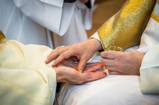 Anointing of the hands.