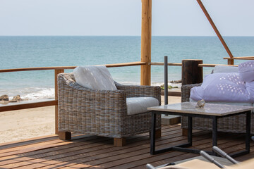 Tropical beach with palm trees and wooden walkway, Mancora Piura Peru