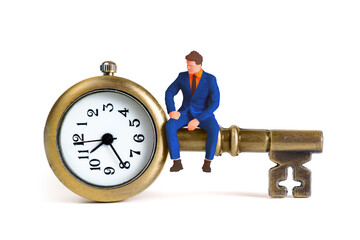 Miniature Man Figure and Vintage Key with a Pocket Watch Face