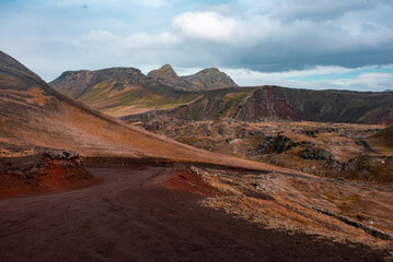 Colorful Volcanic Landscape with Winding Dirt Road